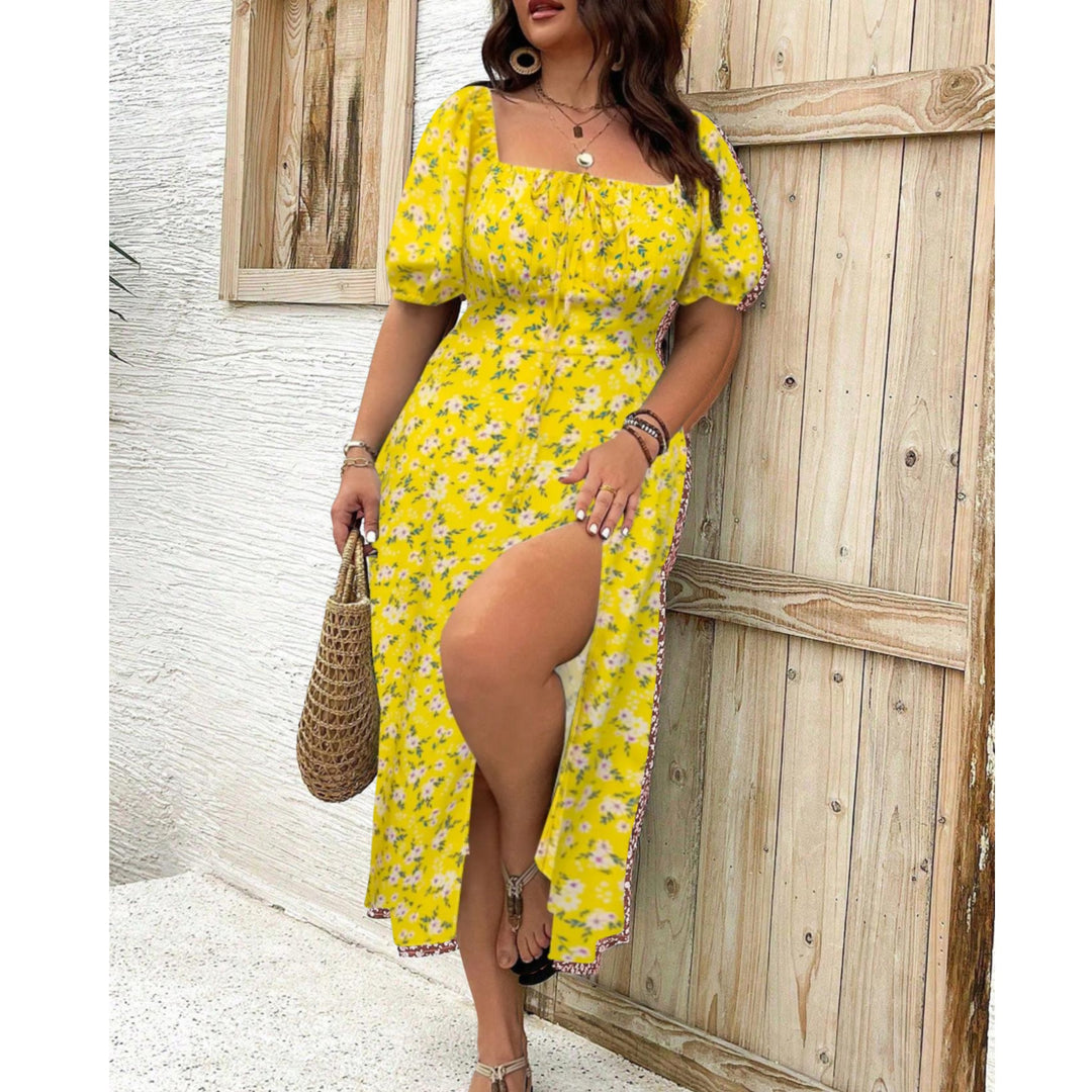 Komfortabel og elegant plus size maxikjole med pufærmer. Festlig selskabskjole til store størrelser, ideel til aftenbrug.