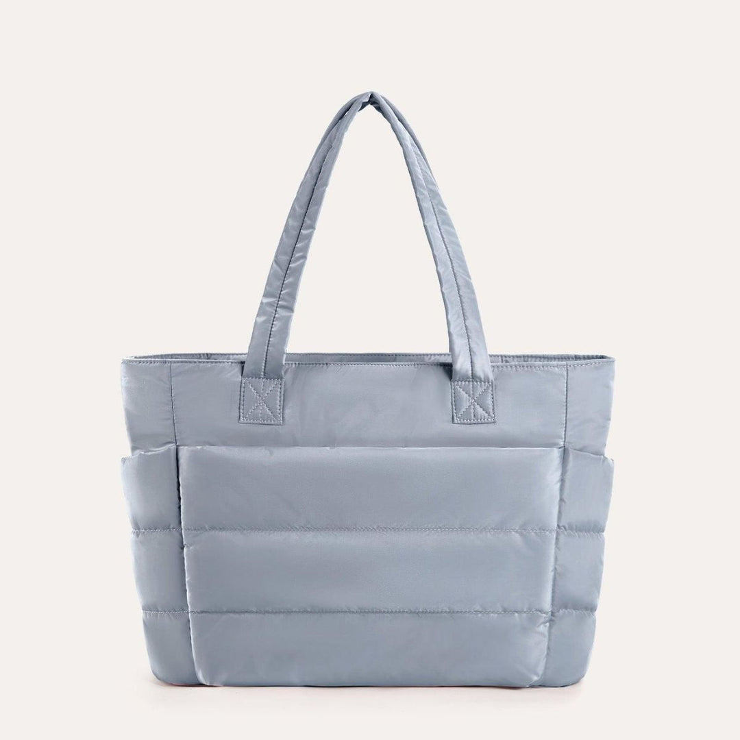 Rummelig dame håndtaske, puffy stil, et must-have til din garderobe.
