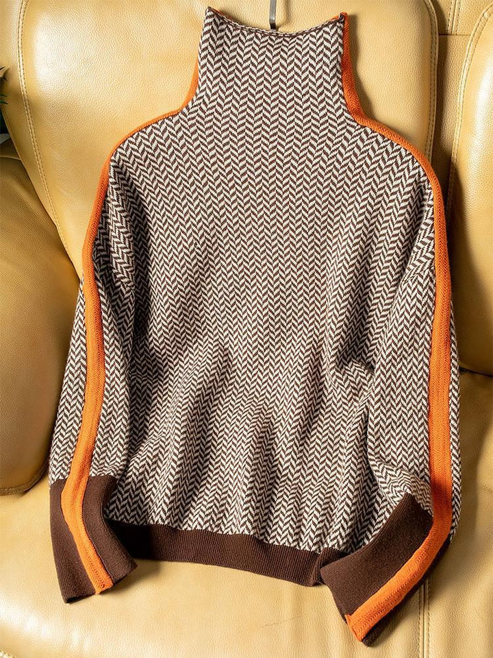Afslappet dame sweatshirt med rullekrave og trendige orange og grønne striber. En mode overdel til efterår.