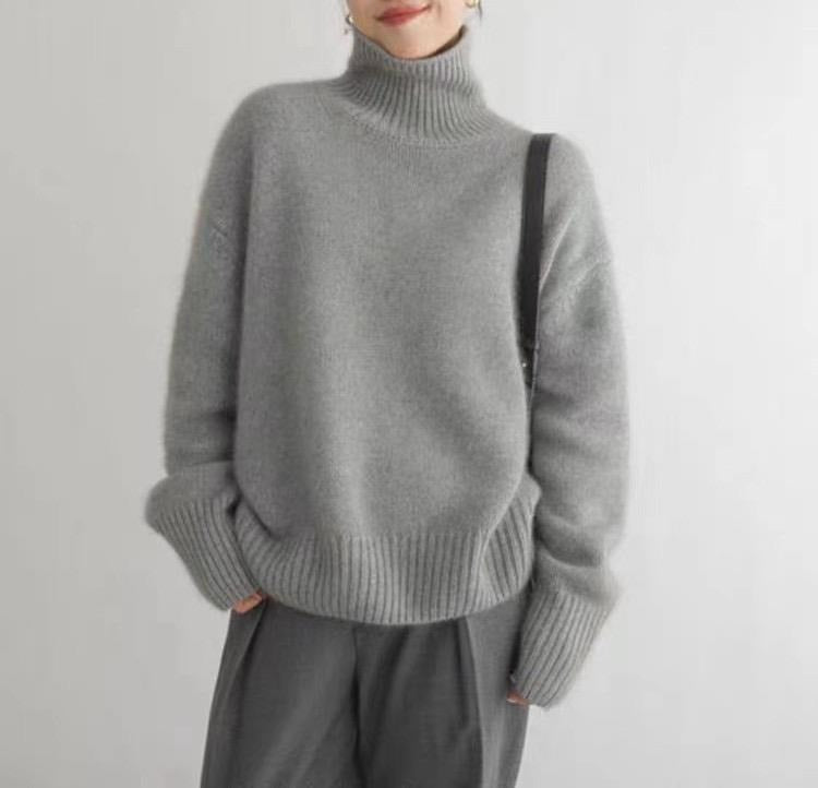 Blød dame rullekravetrøje, der kombinerer komfort med elegance. Perfekt til en behagelig og smart stil.