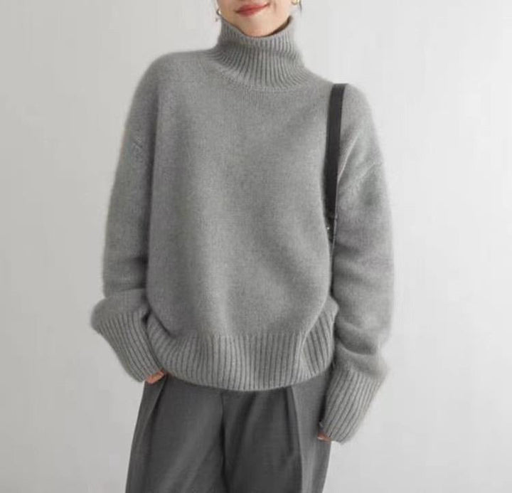 Blød dame rullekravetrøje, der kombinerer komfort med elegance. Perfekt til en behagelig og smart stil.