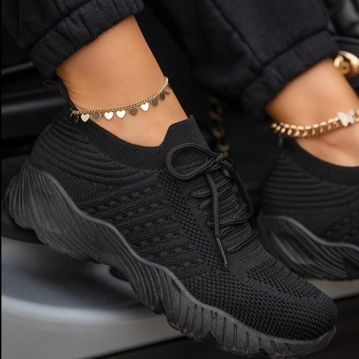 "Dame sneakers i elegant design, komfortabel med fleksibel sål og åndbare materialer, ideel til daglig brug."