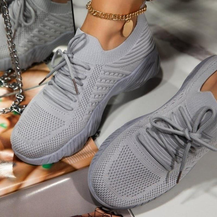 "Dame sneakers i elegant design, komfortabel med fleksibel sål og åndbare materialer, ideel til daglig brug."