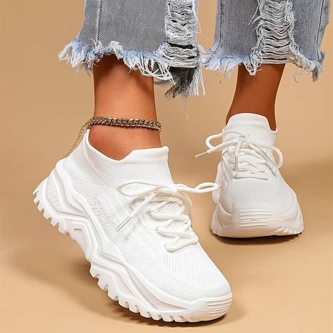 Dame sneakers med ekstra fodstøtte og åndbart design. Perfekte komfortsko til daglig brug.