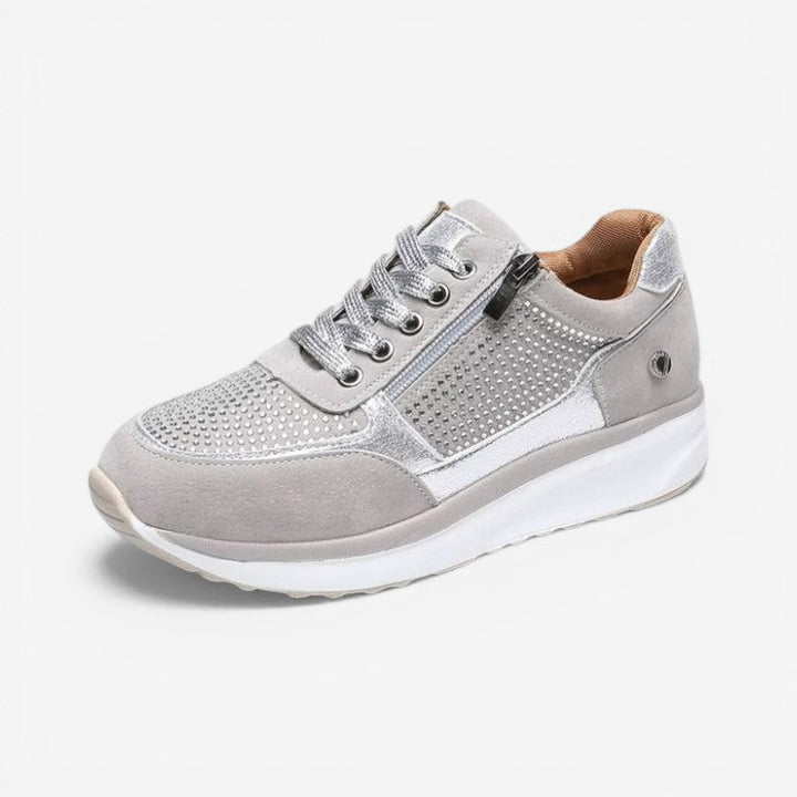 Letvægts dame sneakers med behagelig rund snude og funktionel lynlås. Perfekt komfort til urban stil.