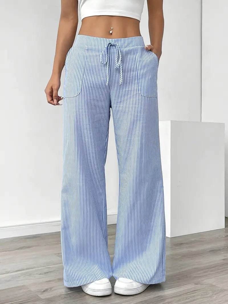 Stribede damebukser med vidde ben og lommer. Casual look, lette og åndbare til sommer.