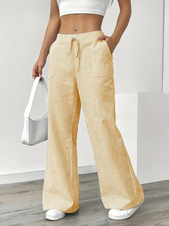 Sommerbukser: Stribede wide leg damebukser med lommer. Komfortable og trendy til kvinder.