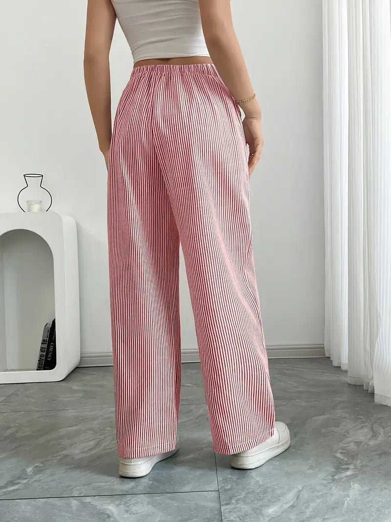 Komfortable sommerlige stribede wide leg bukser med lommer til kvinder. Trendy og funktionelle.
