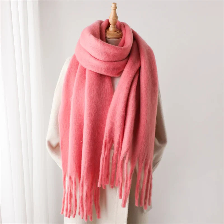 Flot wrap tørklæde med store frynser, et elegant tilbehør til enhver dame.