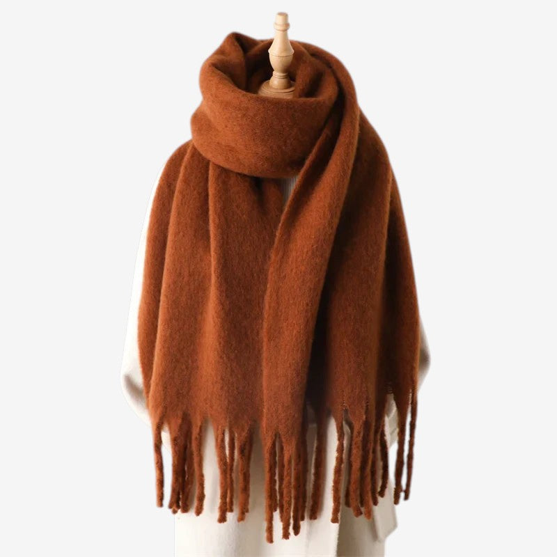 Mode tørklæde til damer med dekorative store frynser i trendy design.
