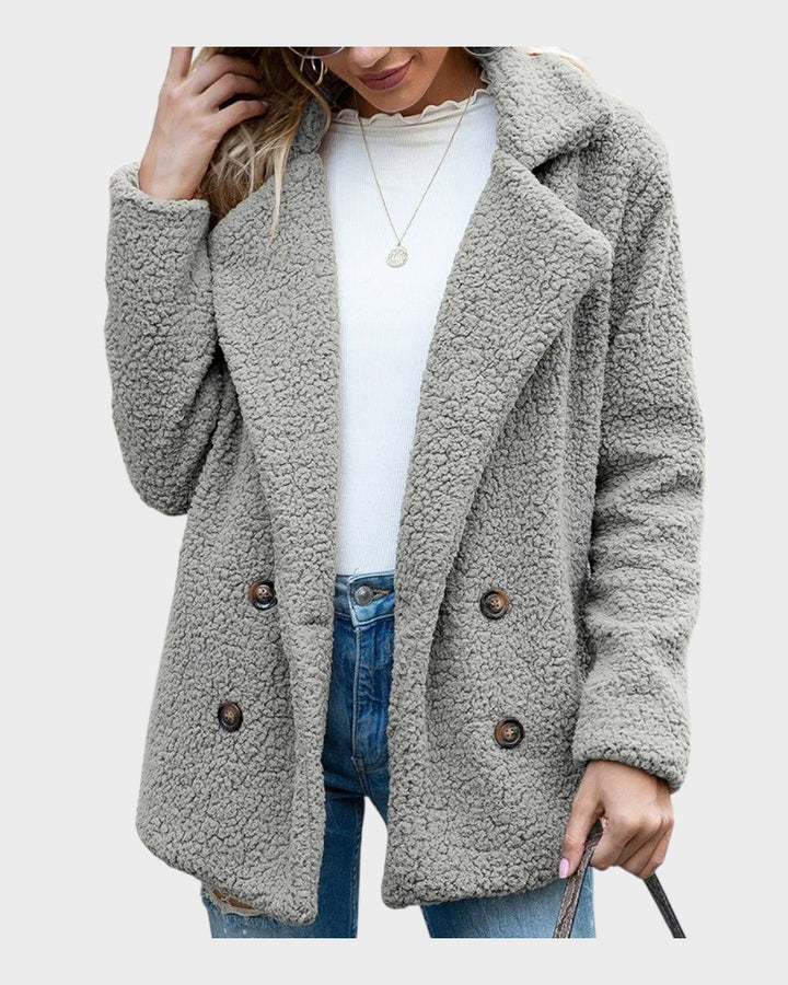 Dame fleecefrakke i teddylook. Superblød og varm frakke, perfekt til en kold vinterdag.