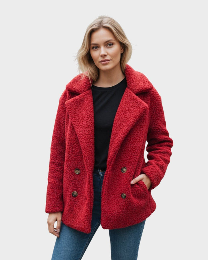 Alsidig dame teddyfrakke. Komfortabel og varm polyesterfrakke, ideel til efterår og vinter.