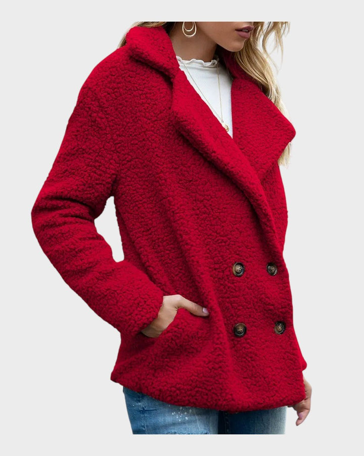 Elegant dame vinterfrakke. Blød teddyfleece, der giver varme og stil til enhver lejlighed.