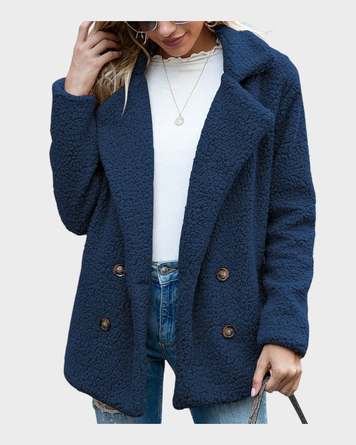 Teddyfleece frakke til damer. Elegant og varm fleecefrakke, perfekt til en stilfuld vintergarderobe.