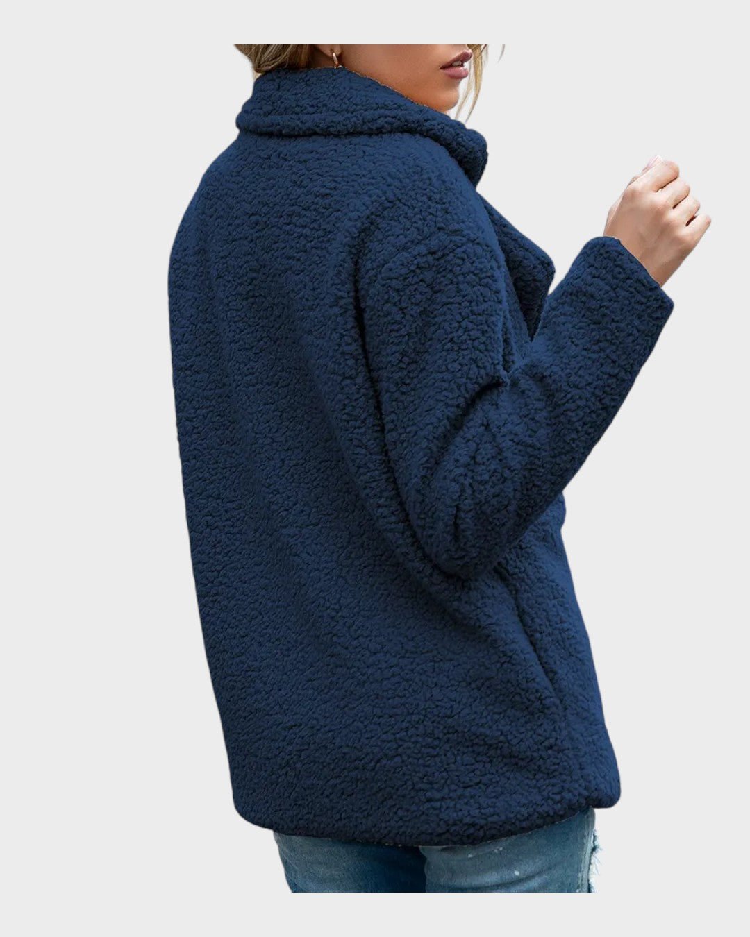 Komfortabel vinterfrakke. Damefrakke i varm teddyfleece, ideel for afslappet elegance.