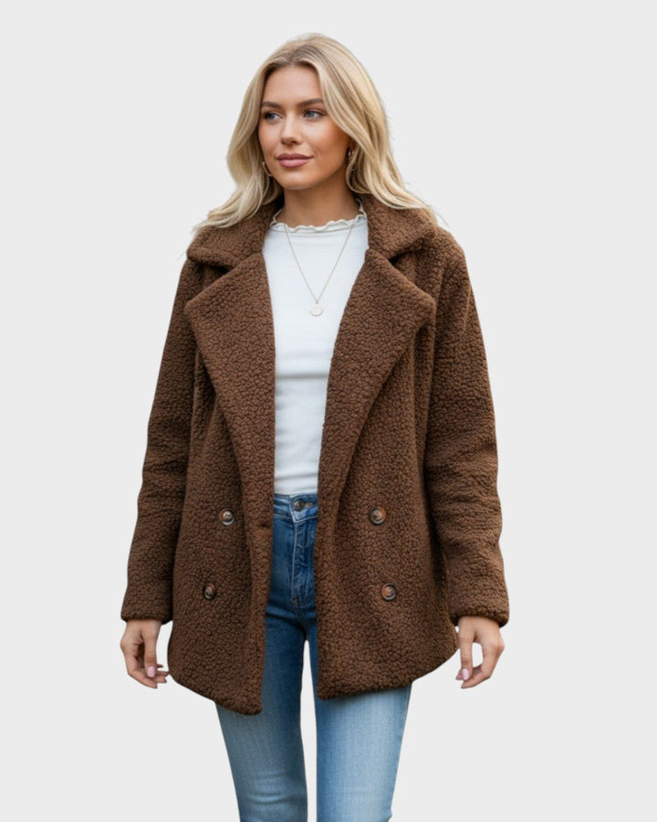 Dame efterårsfrakke. Hyggelig teddyfleece frakke, elegant og varm til overgangssæsonen.