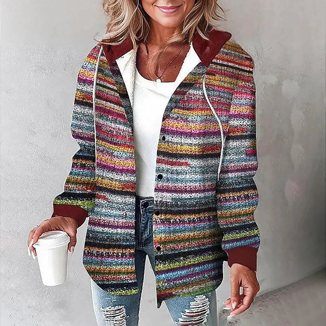 Stilfuld ternet damejakke med funktionel hætte. En alsidig skjortejakke til et moderne casual look.