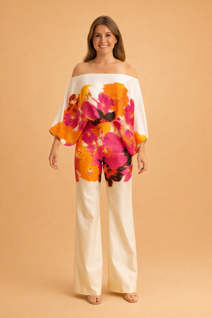 Elegant dame sæt: Asymmetrisk bluse & vide bukser. Ideelt til sommer, festtøj eller et afslappet look.