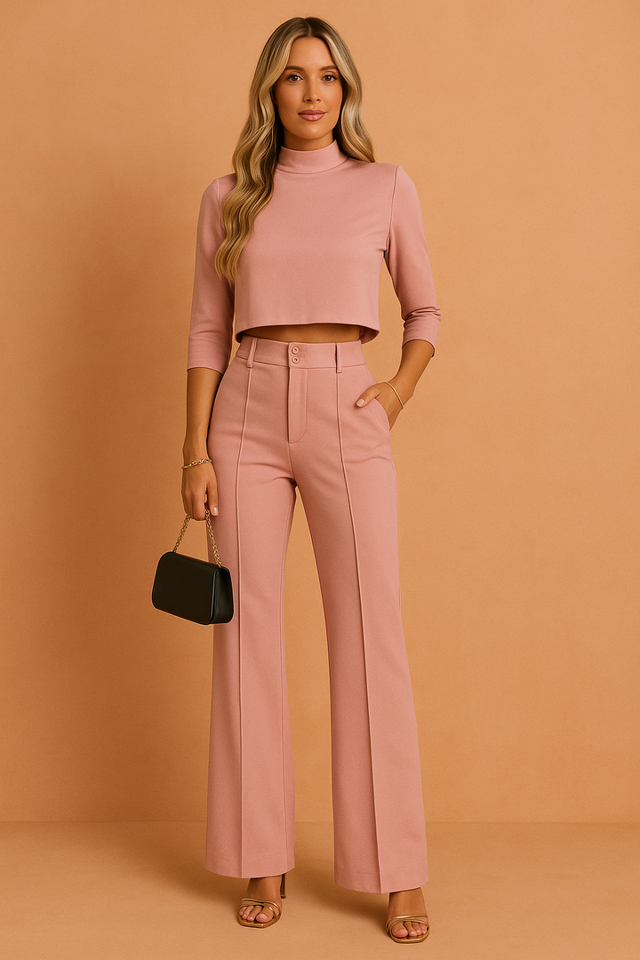 Dame festtøj sæt: elegant crop top og komfortable vide bukser. Perfekt til en stilfuld aften.