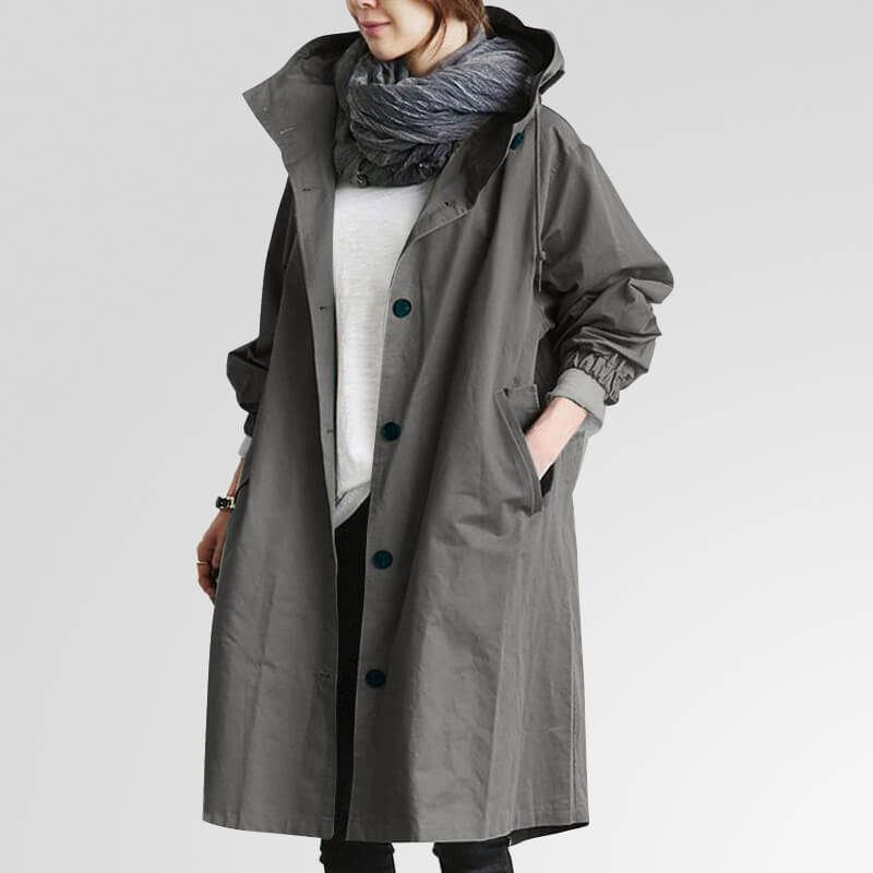Dame trenchcoat med hætte, perfekt til overgangsperioder. Stilfuld og komfortabel letvægtsjakke.