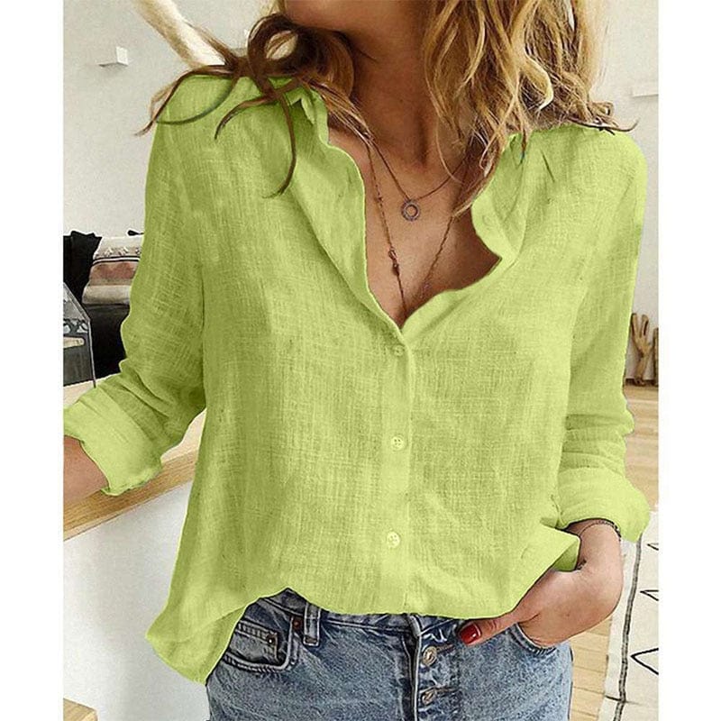 Trendy dame V-hals bluse med knapper og lange ærmer. Komfortabel og moderne, perfekt til en stilfuld hverdag.