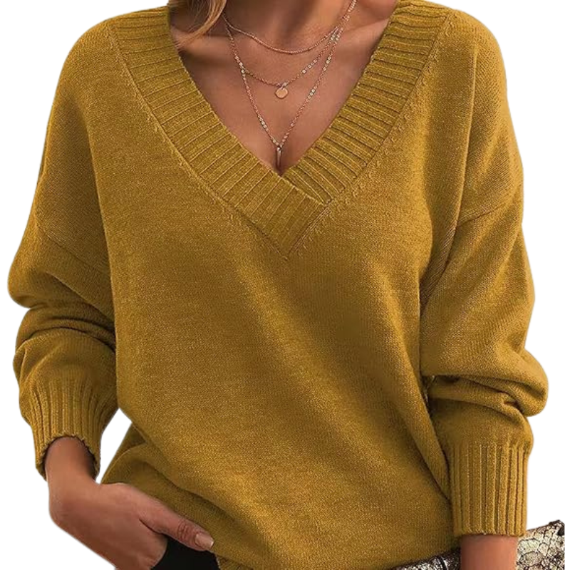 Elegant dame sweater med V-hals. Afslappet pasform, blød strik til stilfuld hverdagsbrug.