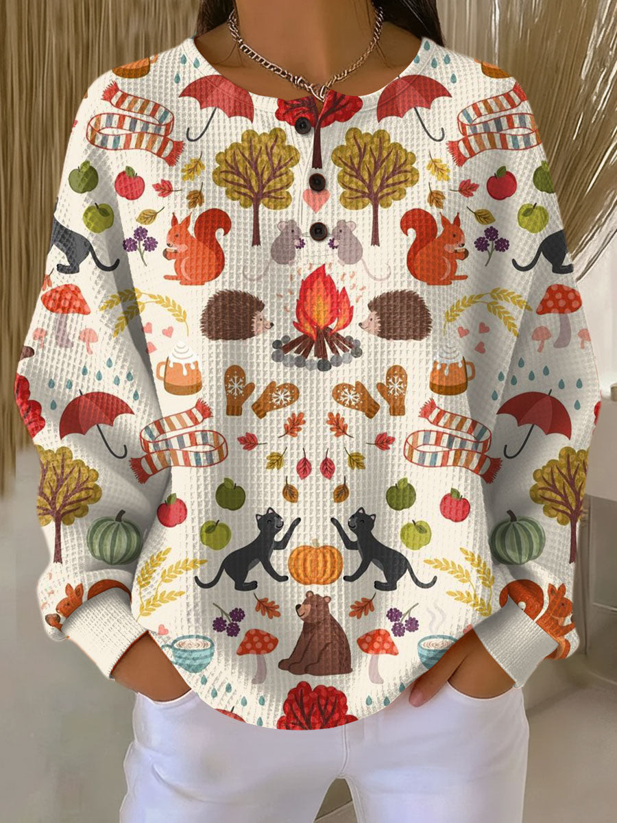 Dame vaffelstrikket sweater i blød, varm kvalitet. Perfekt til efterår og vinter, giver komfortabel og elegant stil.