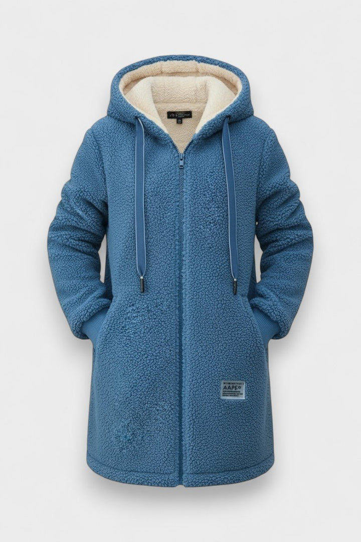 Afslappet dame teddyjakke med hætte for varme og komfort. Ideel som vinter- eller hverdagsjakke.