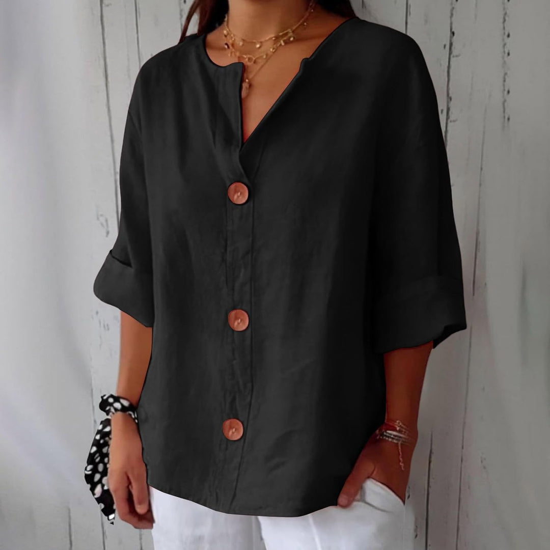 Luftig damebluse i afslappet stil, hængende. Komfortabel kortærmet sommerbluse. Perfekt til forår og sommer mode.