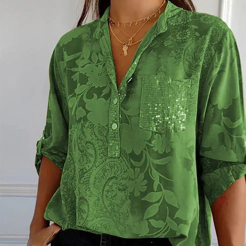 Blomstret V-hals bluse med lange ærmer, ideel til en elegant og behagelig stil.