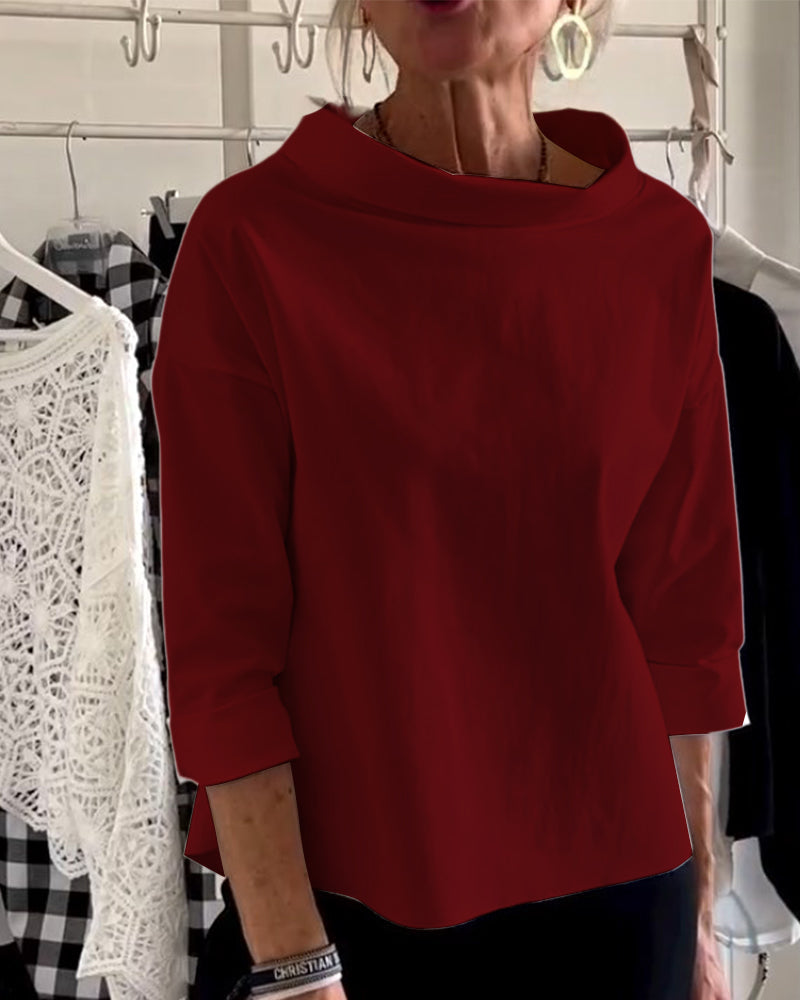 "Dameskjorte med elegant bådudskæring, 3/4-ærmer, ideel til modebevidste kvinder, til både arbejde og fritid."