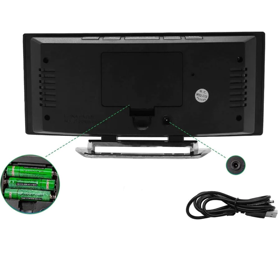 Batteridrevet digitalt vækkeur med buet skærm, praktisk og stilfuldt.