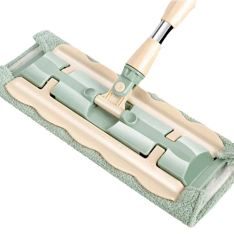 Fugtig SwiftSwipe flad moppe klar til effektiv gulvvask. Fjerner nemt snavs og pletter med mikrofiber.