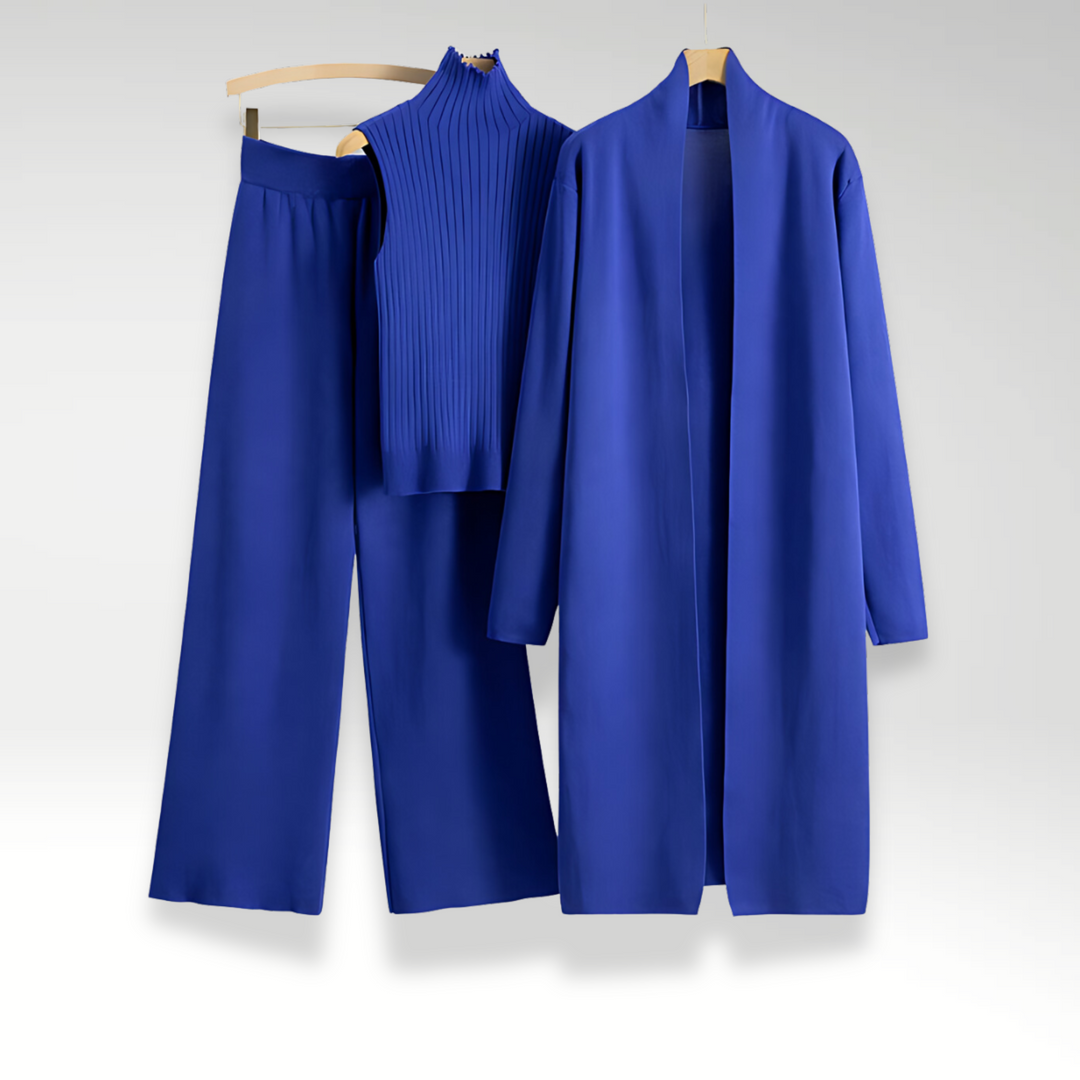 Professionelt dame jakkesæt i 3 dele: blazer, matchende vest og klassiske bukser. Giver et stærkt power look.