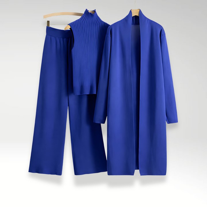Professionelt dame jakkesæt i 3 dele: blazer, matchende vest og klassiske bukser. Giver et stærkt power look.