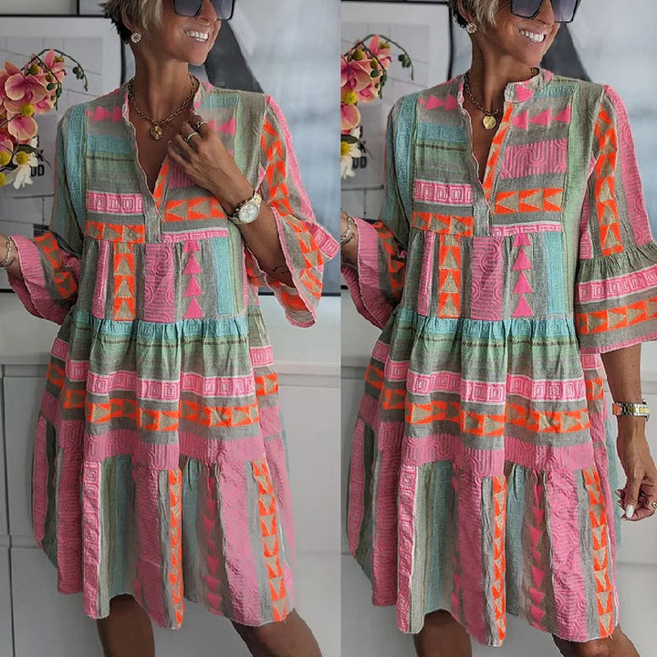 Elegant A-line kjole, perfekt som brunchkjole eller havefestkjole. Let og luftig forårsstil.