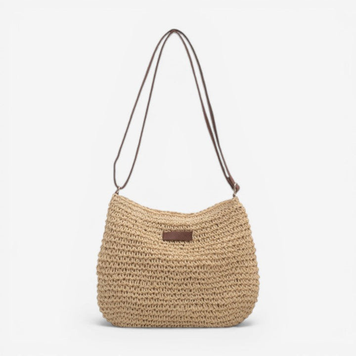 Elegant beige dametaske. Stor, rummelig skuldertaske perfekt til hverdag og kontor. Funktionel, minimalistisk design.