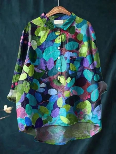 Festlig blomstret bluse med elegant blomsterprint. Ideel til særlige lejligheder og feminin mode.