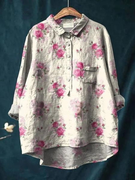 Frisk sommer bluse til kvinder med letvægts blomsterprint og lang ærme. Perfekt til varme dage.