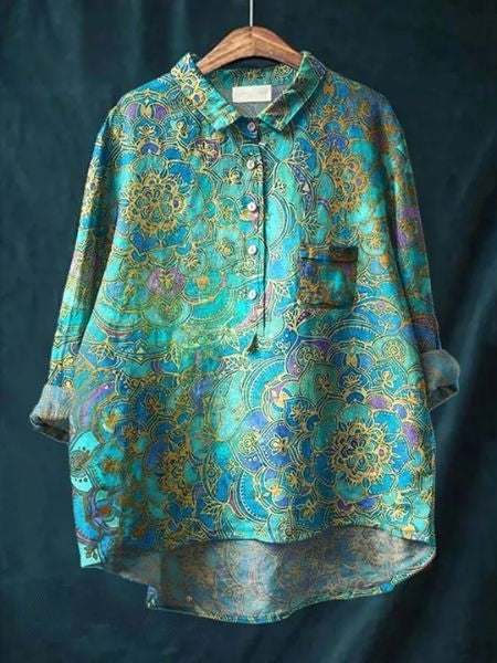 Alsidig langærmet blomstret bluse til kvinder. Elegant, feminin og smukt blomsterprint.