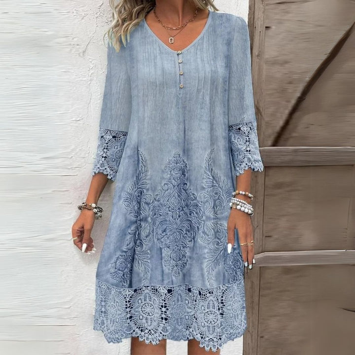 Elegant blomstret midikjole til kvinder, perfekt til sommerfester og havefester. Komfortabel sommerstil.
