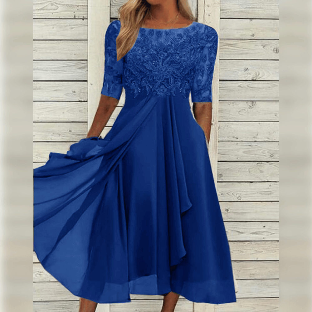 Elegant og stilfuld aftenkjole for kvinder med delikate blonder og 3/4 ærmer til fest.