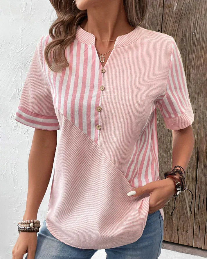 "Elegant bluse i blød luksuriøs stof, fås i flere farver som blå, grøn og rosa, stilfuld og komfortabel til enhver lejlighed.