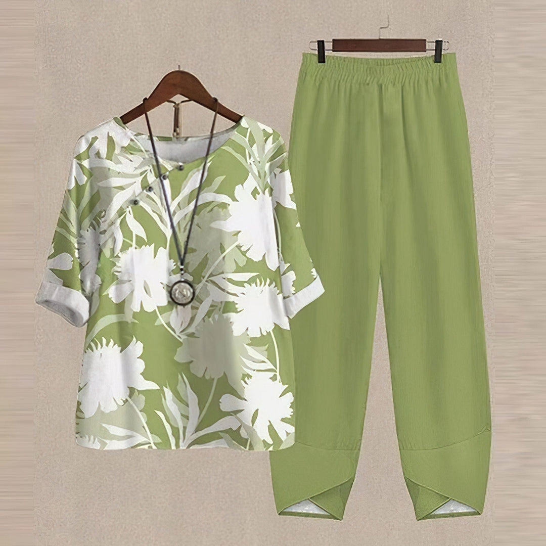 Kvinders elegant bluse og bukse sæt med moderne print, perfekt til både arbejde og fritid.