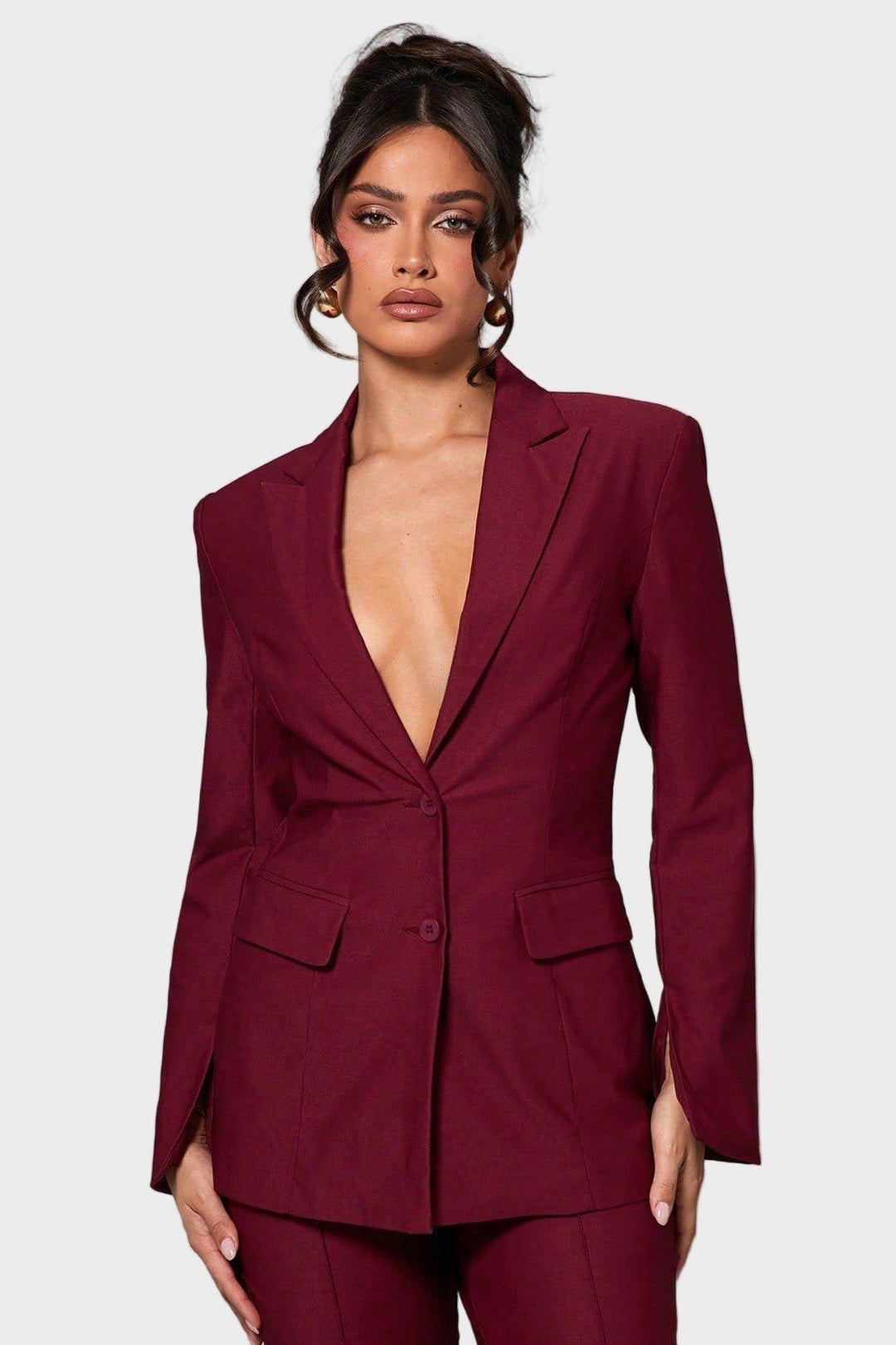 Elegant bordeaux kravefri blazer til kvinder, perfekt til kontor eller fest. Stilrent slimfit design.