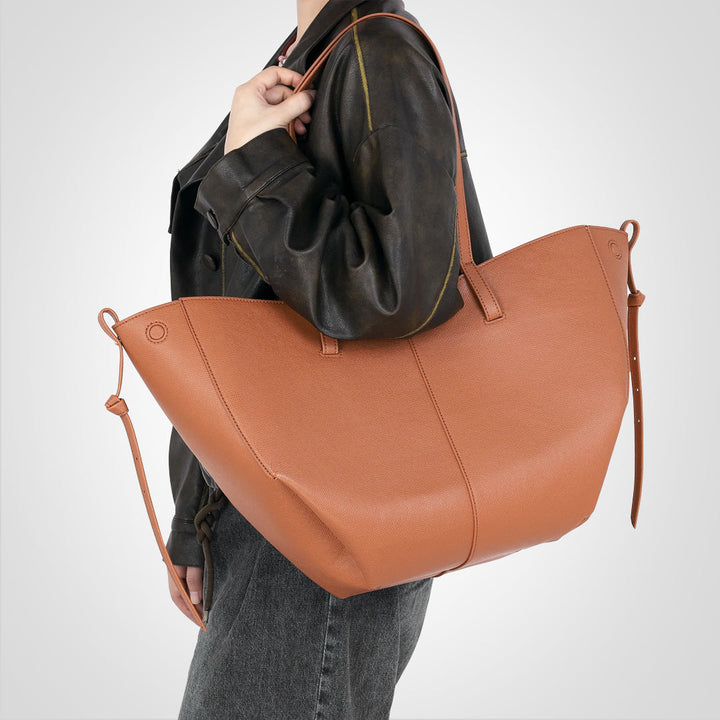 Elegant brun vintage skuldertaske til damer. Stilfuld og praktisk hverdagsbrug for den moderne kvinde.