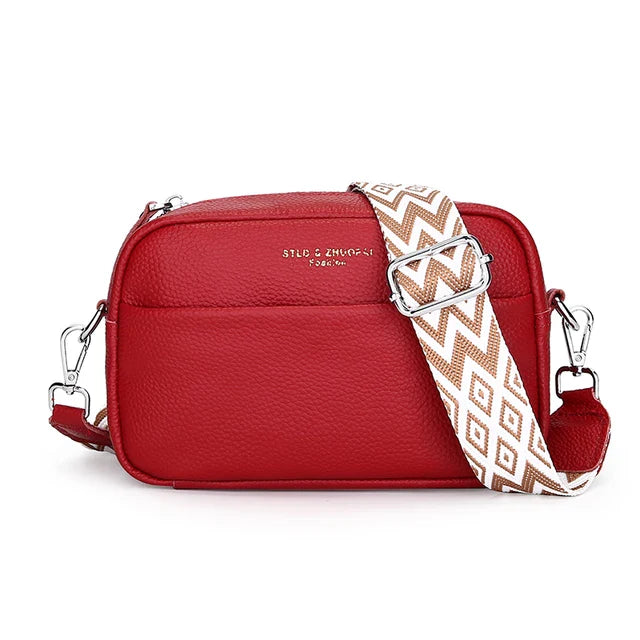 "Elegant crossbody-taske i ægte læder til kvinder; alsidigt design med justerbar rem og flere rum; passer til enhver stil."