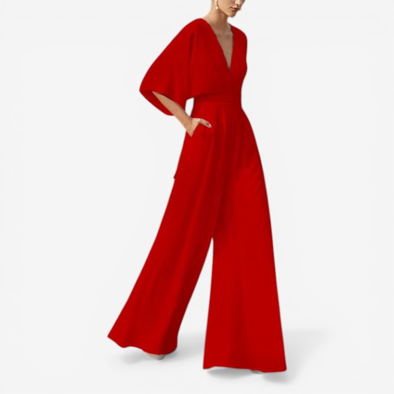 Komfortabel Daisy jumpsuit for kvinder. Kortærmet med V-hals og løs pasform til en afslappet sommer.