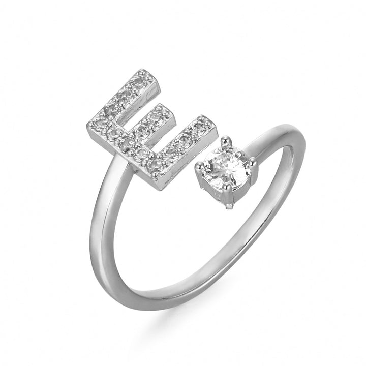 Forgyldt bogstavring med initial 'X'. Diskret og personlig, justerbar ring i forgyldt design.