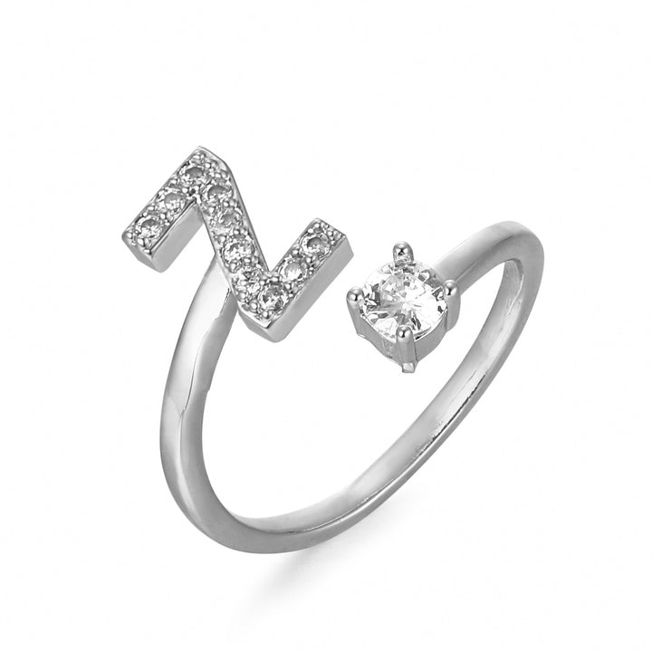 Forgyldt bogstavring med initial 'Y'. Elegant justerbar ring, med et personligt bogstav.